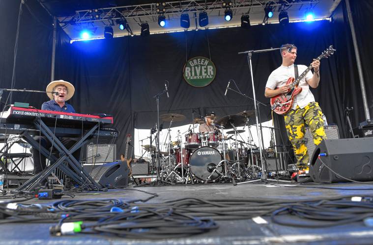 Jon Cleary, left, seen with his band at the 2023 Green River Festival, plays the Bombyx Center in Florence March 24.