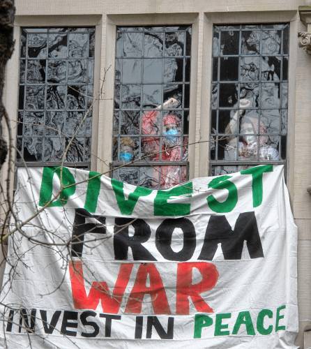 Smith College students during a rally after occupying College Hall as part of a protest demanding divestment from military contractors held Thursday afternoon, March 28, 2024.