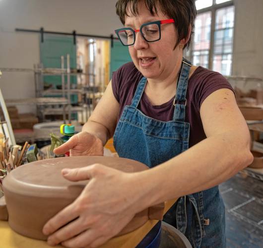 Tiffany Hilton in her Florence studio. She is one of eight regional pottery hosts and 21 visiting artists taking part April 27-28 in Asparagus Valley Pottery Trail, which is celebrating its 20th anniversary this year.