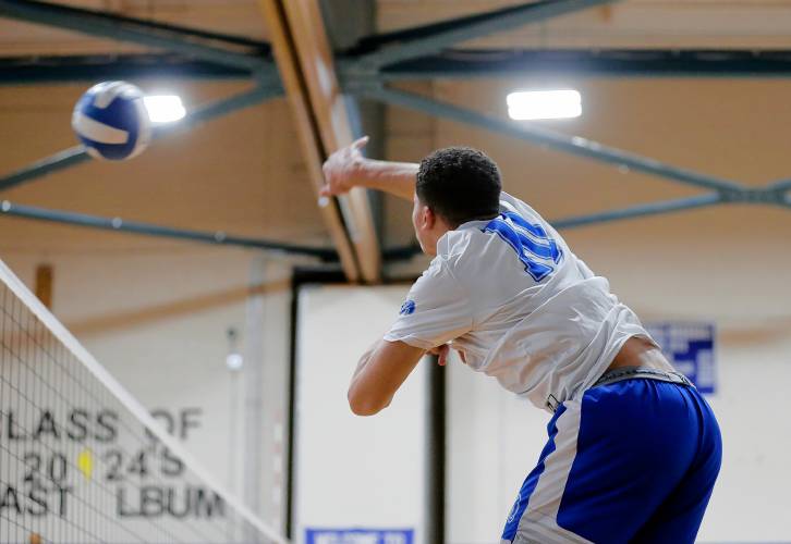 Granby’s Michael Swanigan (10) hits against Athol in the first set Wednesday in Granby.