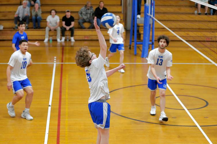 Granby’s Nathan Walsh (5) hits against Athol in the first set Wednesday in Granby.