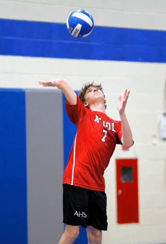 Athol’s Aiden Desruisseau (7) serves against Granby in the second set Wednesday in Granby.