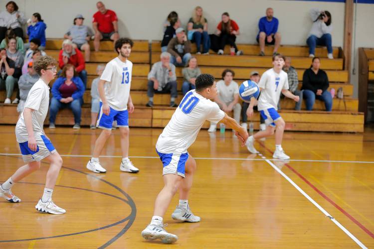 Granby’s Michael Swanigan (10) passes against Athol in the first set Wednesday in Granby.