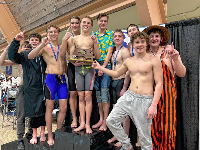 Belchertown boys swimming celebrates its first Central/West title in school history after capturing first place during Sunday’s Central/West Swimming Championships at Springfield College.