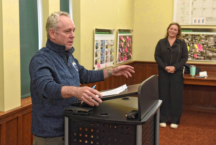Rep. Jeffrey Roy, D-Franklin, House chair of the Telecommunications, Utilities and Energy Committee, speaks to those gathered at the Sunderland Public Library on Friday for a discussion sponsored by Rep. Natalie Blais, D-Deerfield, at right. 