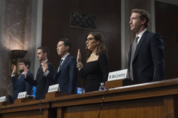 From left; Discord CEO Jason Citron, Snap CEO Evan Spiegel, TikTok CEO Shou Zi Chew, X CEO Linda Yaccarino and Meta CEO Mark Zuckerberg, are sworn in during a Senate Judiciary Committee hearing on Capitol Hill in Washington, Wednesday, Jan. 31, 2024, to discuss child safety. (AP Photo/Manuel Balce Ceneta)