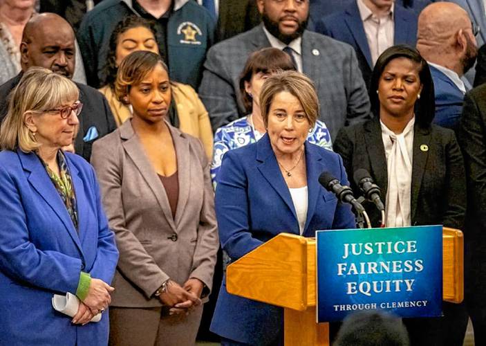 Gov. Maura Healey announces details of her proposed blanket pardon for simple cannabis possession at a Grand Staircase press conference joined by, from left, Senate President Karen Spilka, Attorney General Andrea Campbell, and Cannabis Control Commission Acting Chair Ava Callender Concepcion.