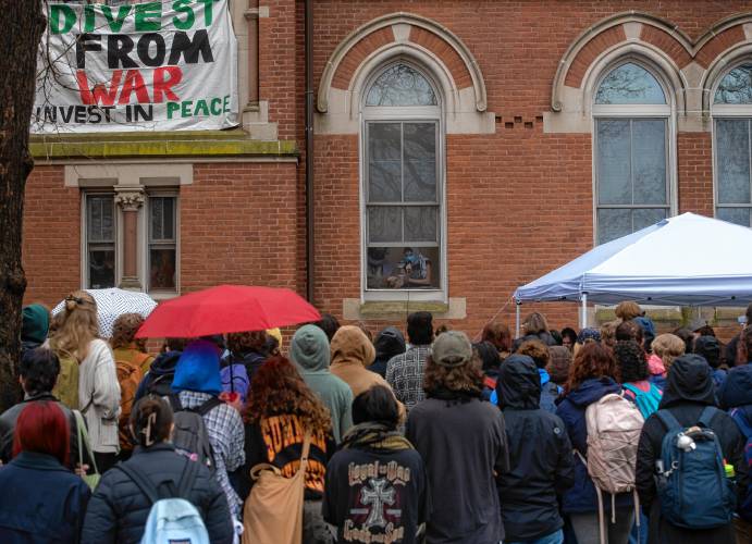 Smith College students during a rally after occupying College Hall as part of a protest demanding divestment from military contractors on Thursday, March 28, 2024.