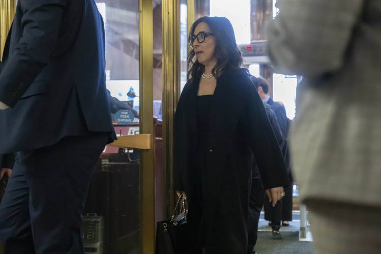 X CEO Linda Yaccarino arrives to appear before the Senate Judiciary Committee's hearing on online child safety on Capitol Hill, Wednesday, Jan. 31, 2024 in Washington. (AP Photo/Mark Schiefelbein)
